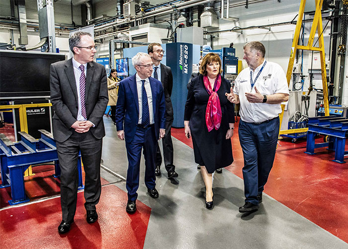 Boeing and NMIS representatives  touring the AFRC