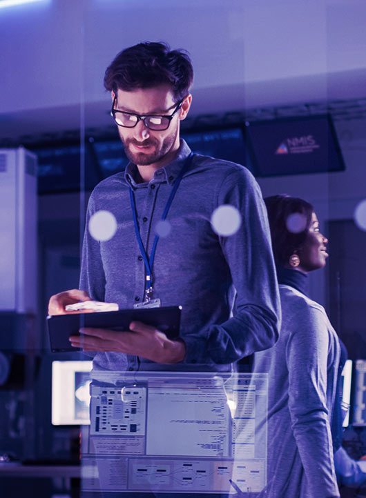 Man working tablet to assess computer data